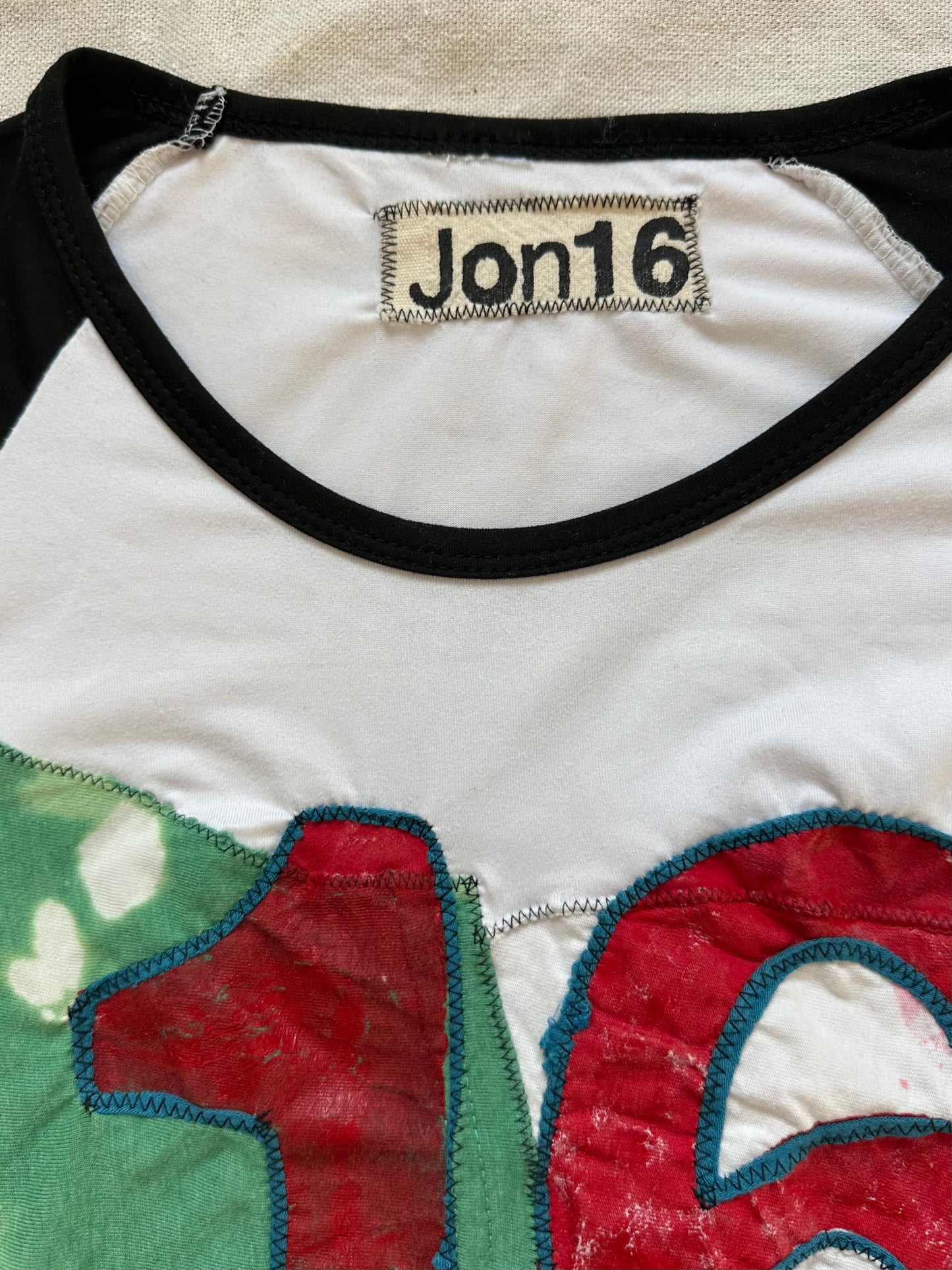 Jon16 raglan tee