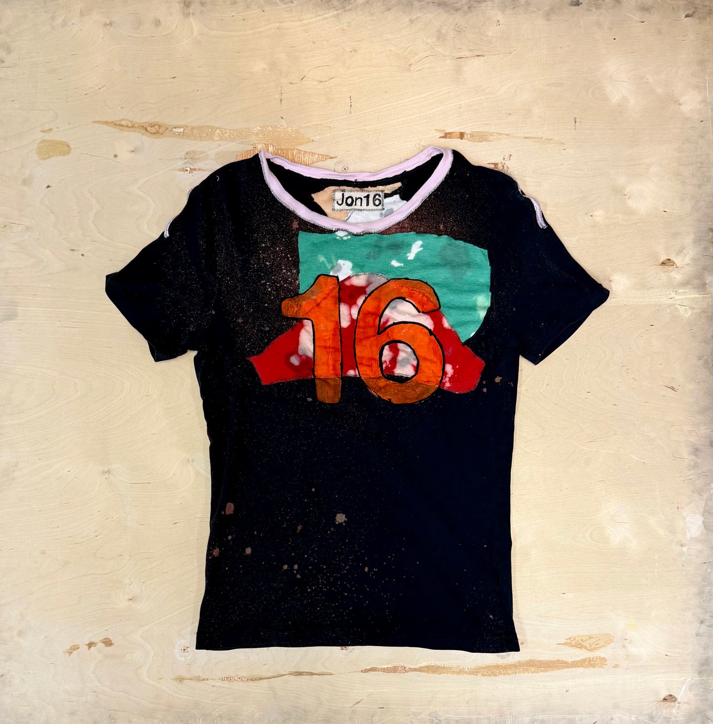 Jon16 half crescent tee